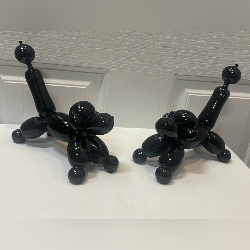 A pair of 2 Black Balloon Dog Sculptures